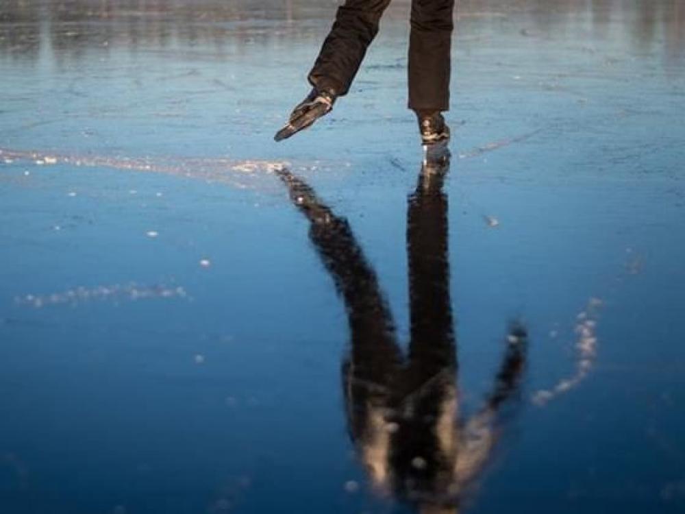 Ice skater on the ice.