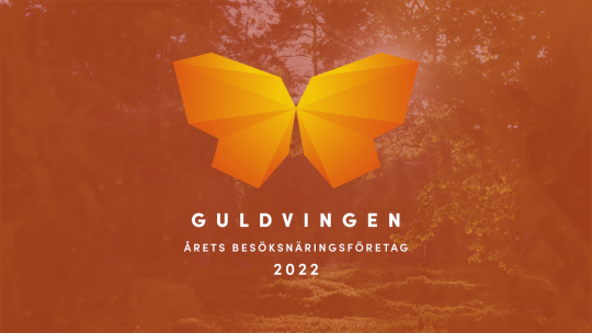 Guldvingens logotyp för priset till Årets besöksnäringsföretag 2022.